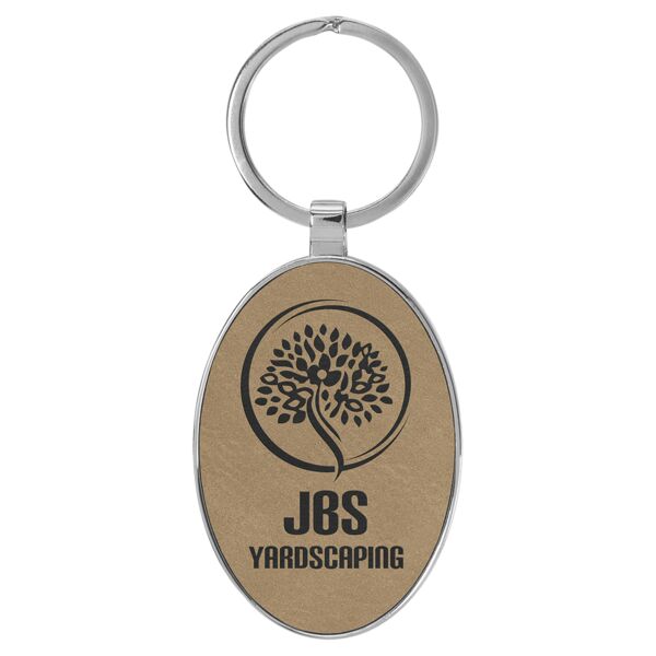 3" x 1 3/4" Laserable Leatherette/Metal Oval Keychain Thumbnail